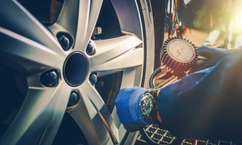 Car Tire Pressure Check in the Auto Service Garage.