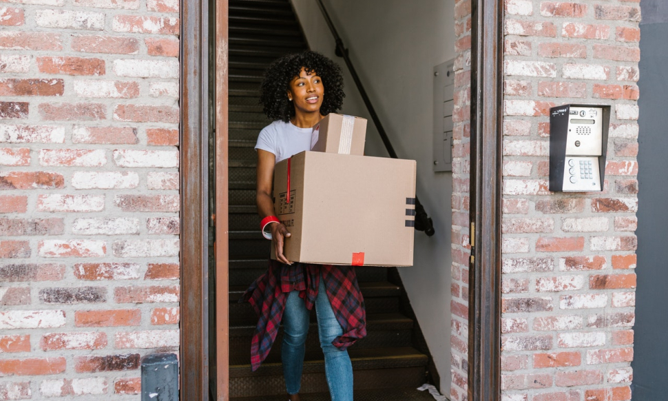 Woman moving out of her apartment